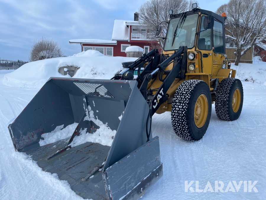 Hjullastare Caterpillar IT12 med multiskopa