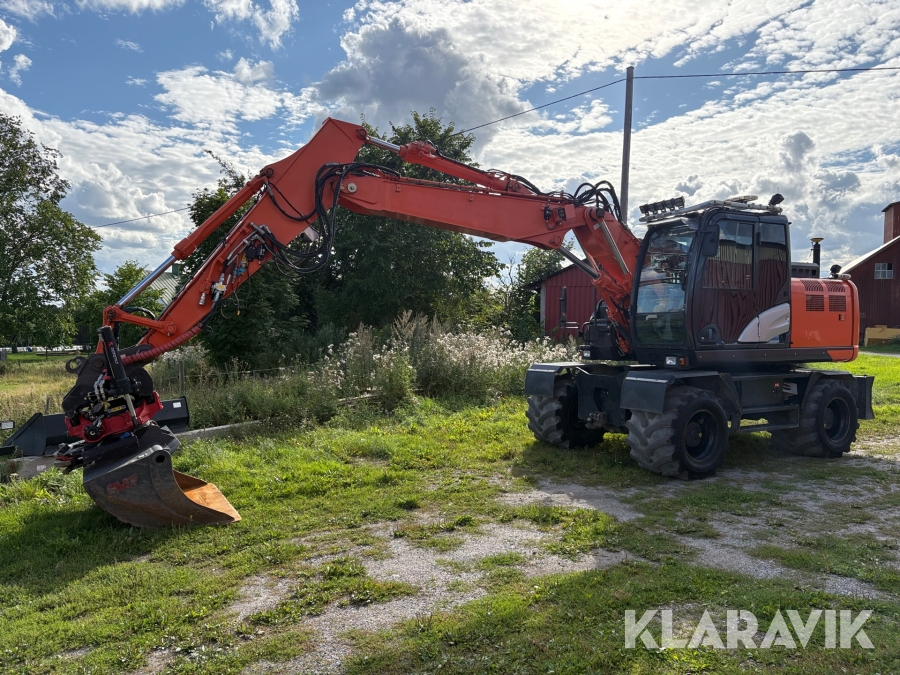 Grävmaskin Hitachi ZX140W-6 med 3D grävsystem, rotator & planeringsskopa