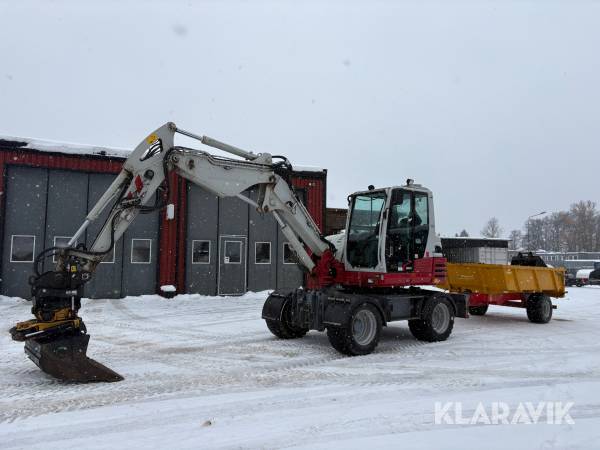 Grävmaskin Take-Job TB295W med kärra och flera redskap