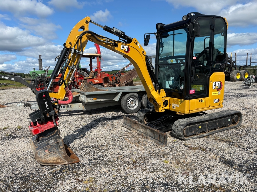 Grävmaskin CAT 302 CR med släpkärra
