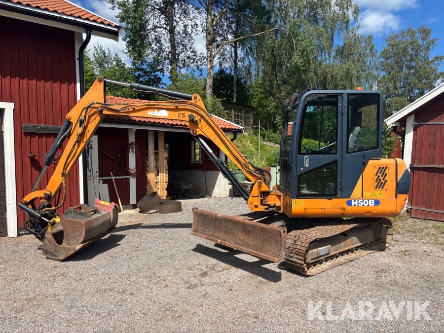 Grävmaskin Hanix H50B med tiltrotator och skopor