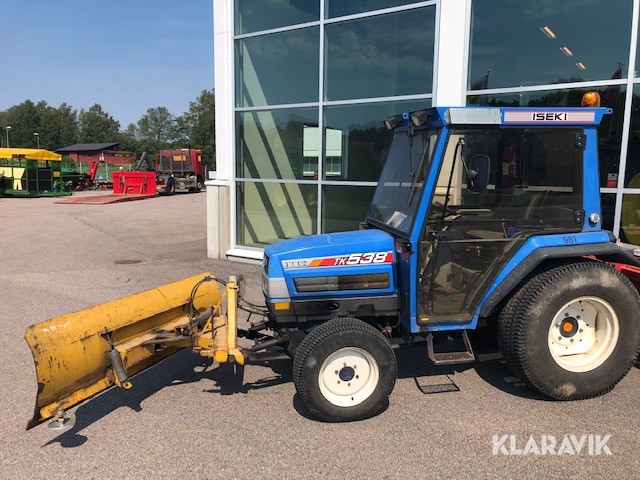 Kompakttraktor med snöplog