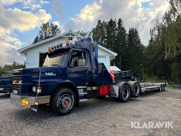 Lastbil Scania R142H med maskintrailer