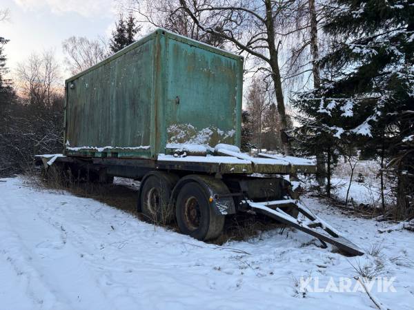 Flaksläp med container