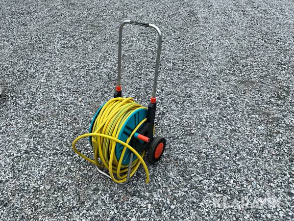 Slangvinda med vattenslang