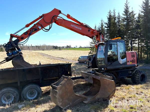 Grävmaskin Hitachi ZX145W-3 med vagn och redskap