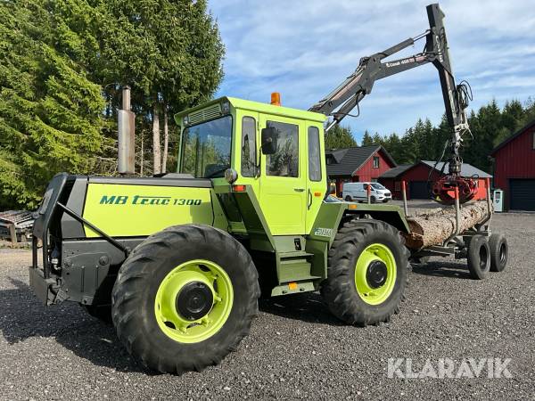 Traktor MB Trac 1300 med kran och skogskärra