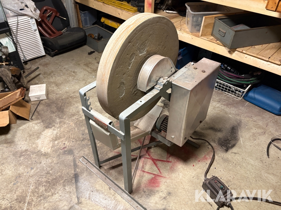 Slipmaskin med slipsten