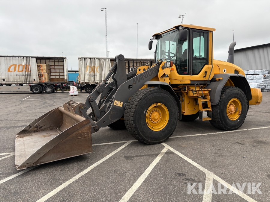 Hjullastare Volvo L90G med planeringsskopa