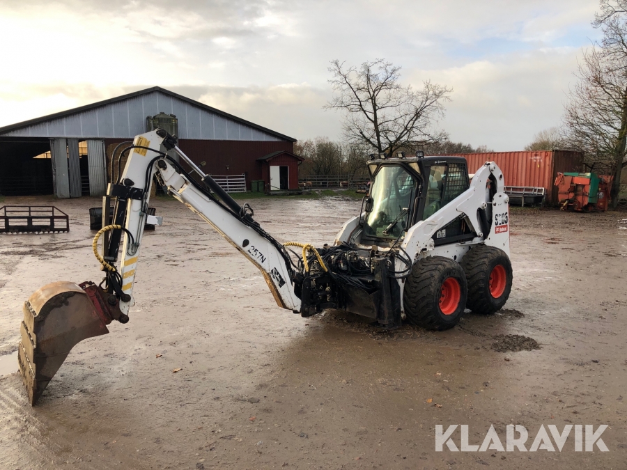 Kompaktlastare Bobcat S205 med grävaggregat och redskap