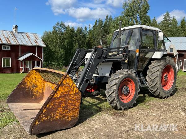 Traktor Case 1394 med snöslunga och skopa
