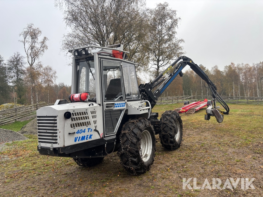 Skördare Vimek 404 T5 med transportvagn