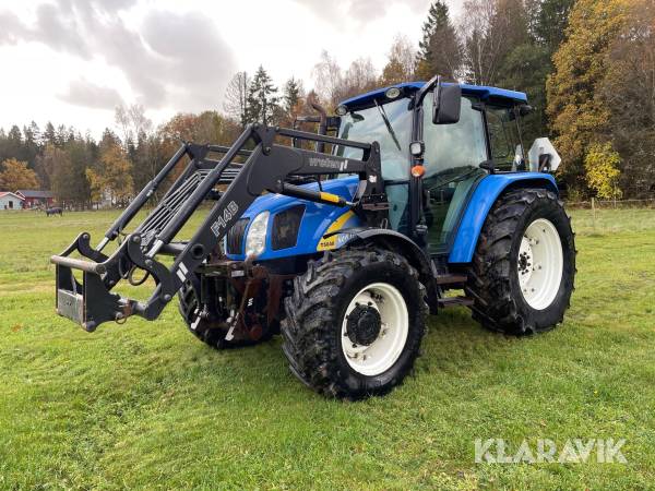 Traktor New Holland T5040 med skogshytt