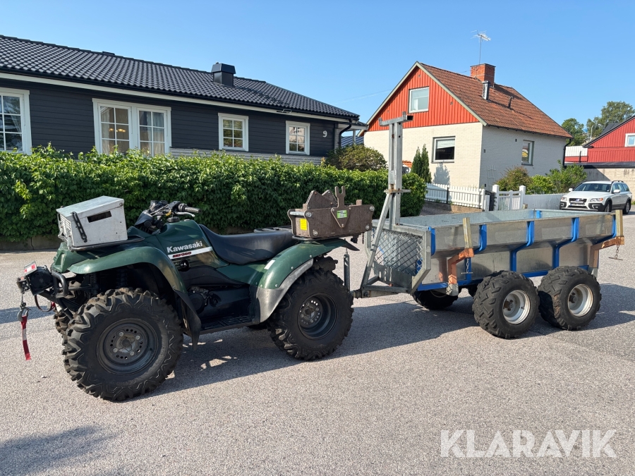 ATV Kawasaki KVF360 med vagn