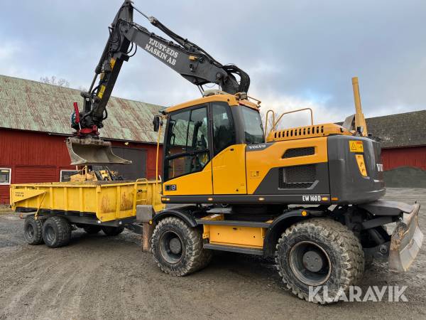 Grävmaskin Volvo EW160D med mycket redskap