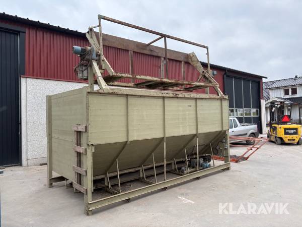 Påmatningsficka med dubbel lådvändare