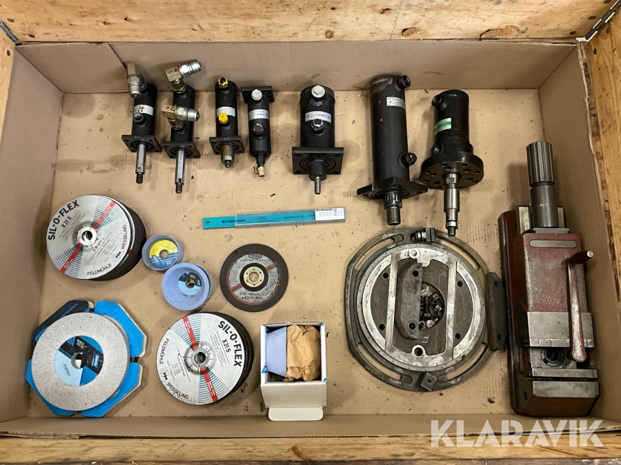 Industridelar och tillbehör hydraulcylindrar, slipskivor, skruvstycke mm.
