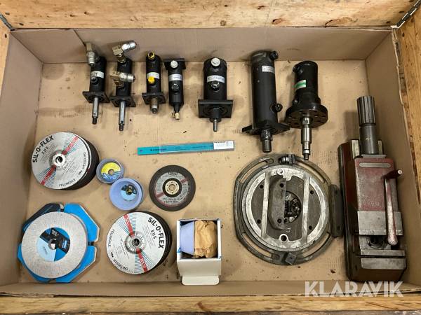 Industridelar och tillbehör hydraulcylindrar, slipskivor, skruvstycke mm.