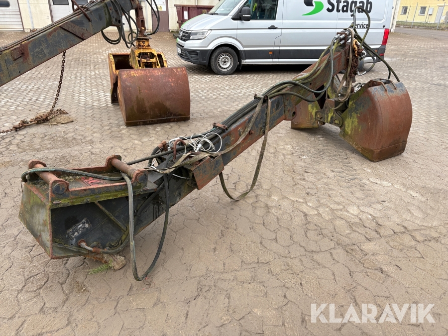 Kranarm med skopa