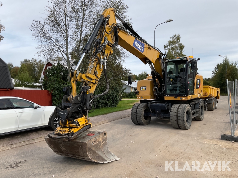 Hjulgrävare CAT M314F med släp