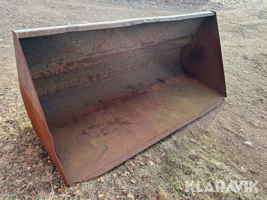 Planeringsskopa med trima fäste