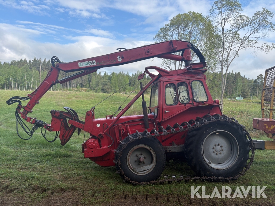 Skotare Massey Ferguson Robur 165 med vagn