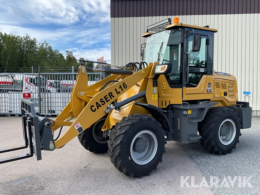 Hjullastare Caser L16 med plogblad och skopor