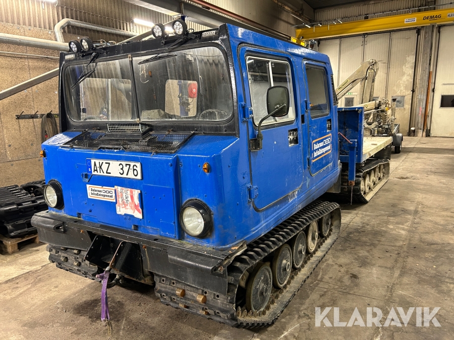 Bandvagn Hägglunds med kran