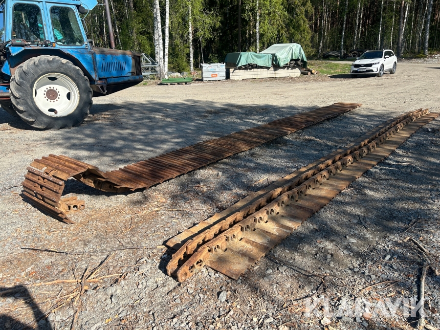 Band till grävmaskin