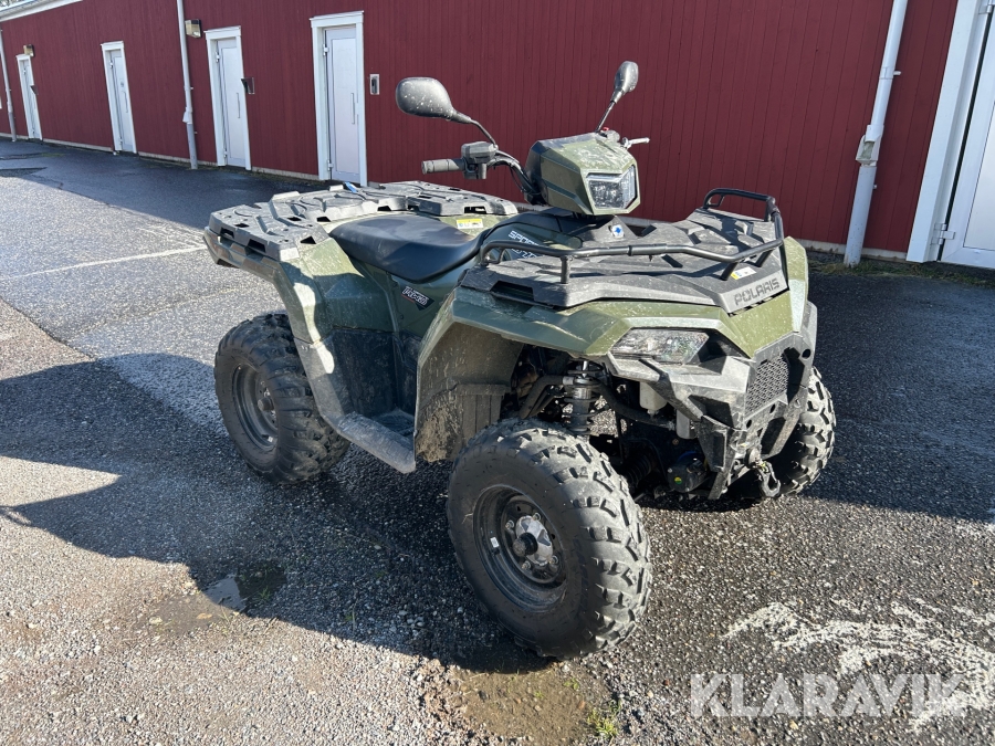 Fyrhjuling Polaris Sportsman 570 med plog och gårdsvagn