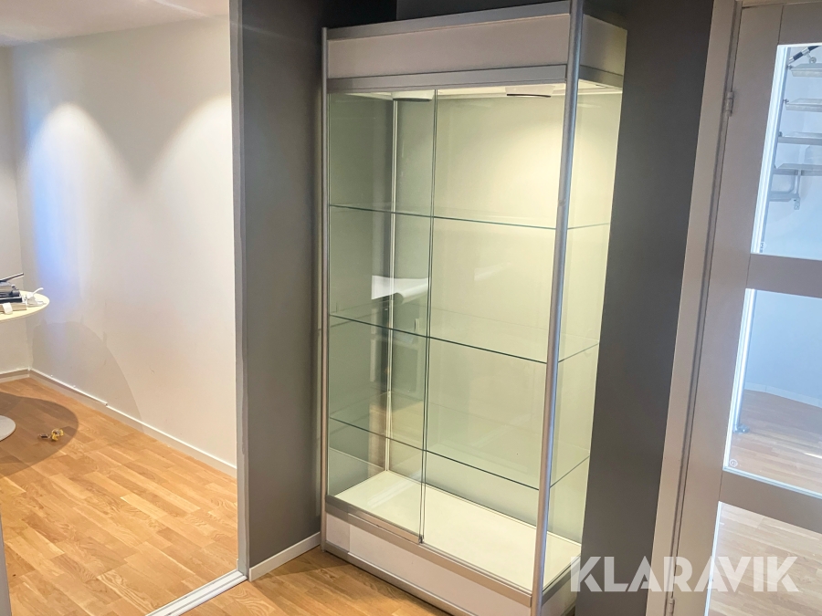 Vitrinskåp/bokhylla i glas med integrerad belysning