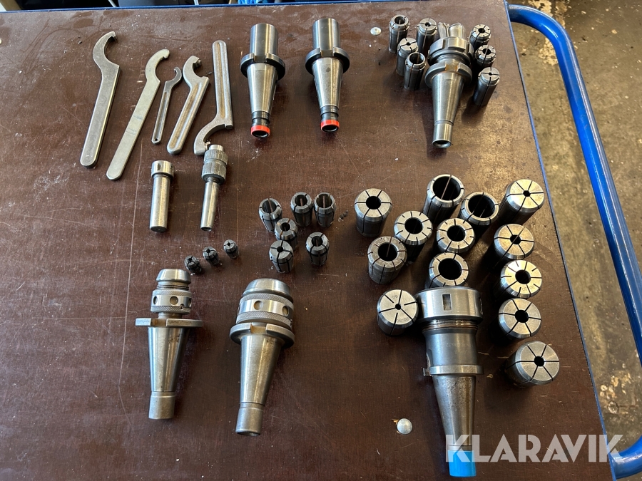 Parti med tillbehör till pinnfräsar