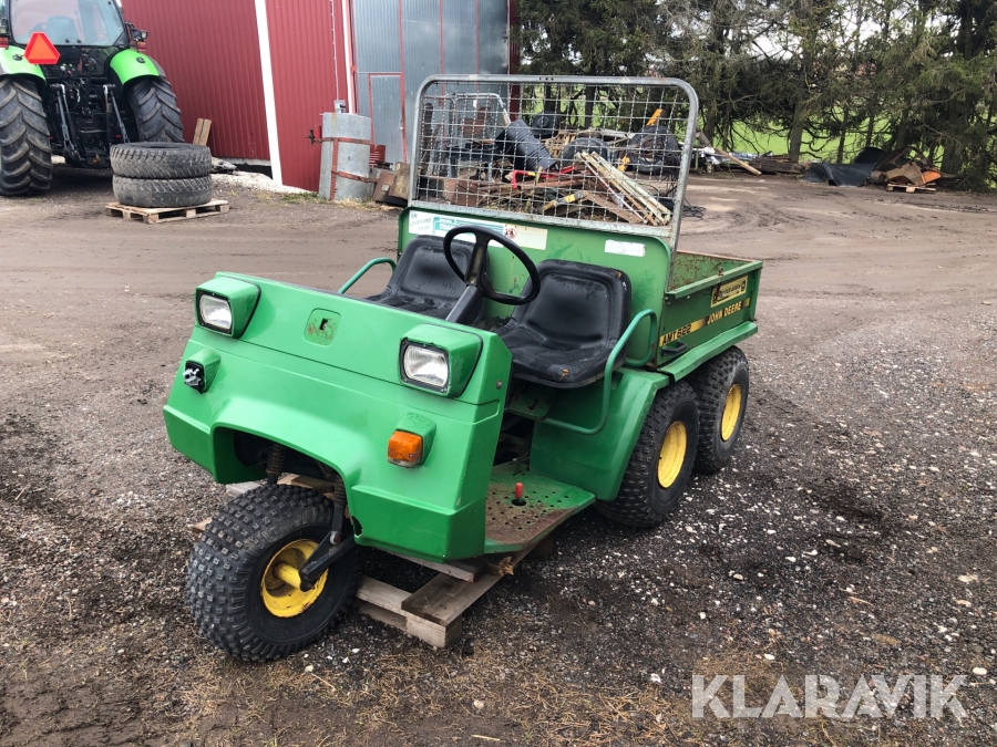 Transportfordon John Deere AMT622 med elektrisk tipp