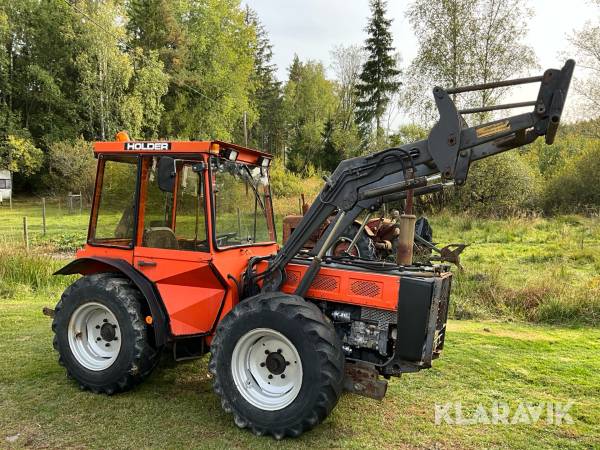 Redskapsbärare Holder C65 cultitrac med lastare