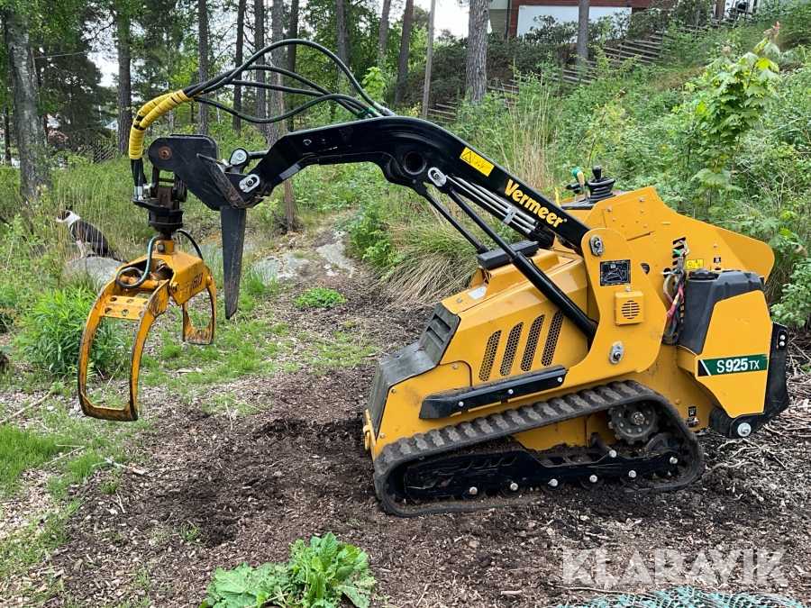 Banddriven Kompaktlastare Vermeer S925TX med stubbfräs och skopa