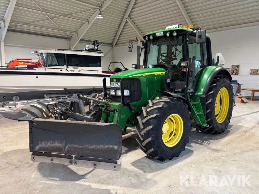 Traktor John Deere 6420S med frontlastare och redskap