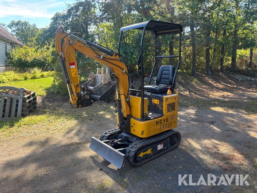 Minigrävare med redskap