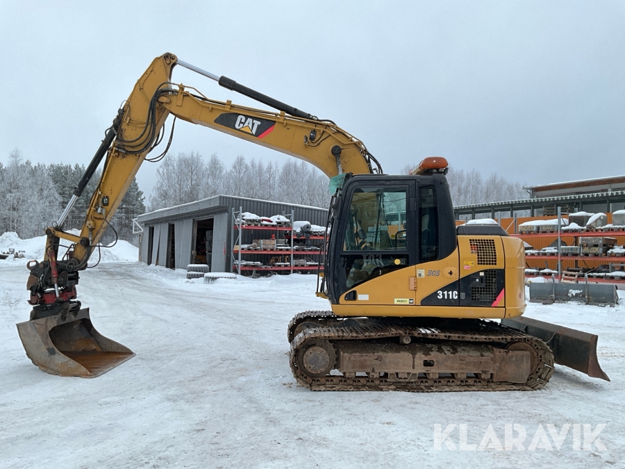Grävmaskin CAT 311C med tiltrotator och skopa