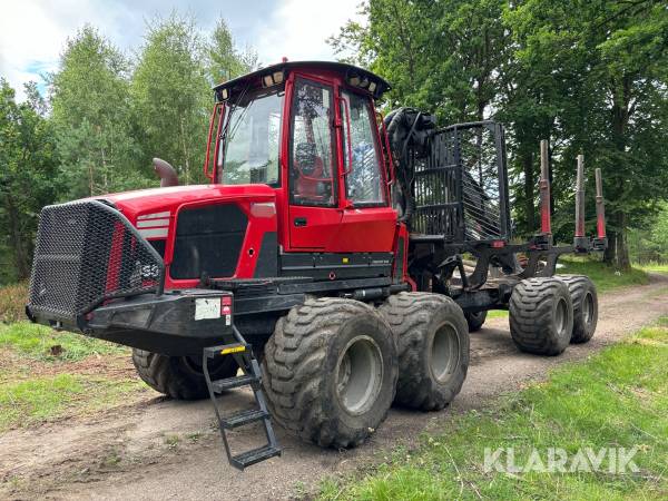 Skotare Komatsu 855 med band, 2 gripar och papphållare