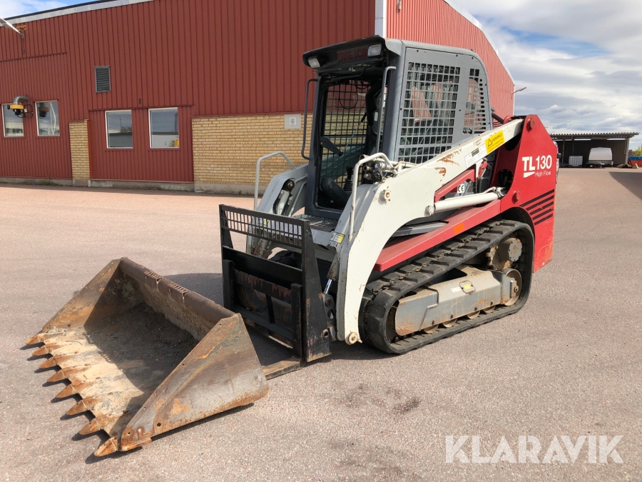 Kompaktlastare Takeuchi TL130 High Flow med redskap