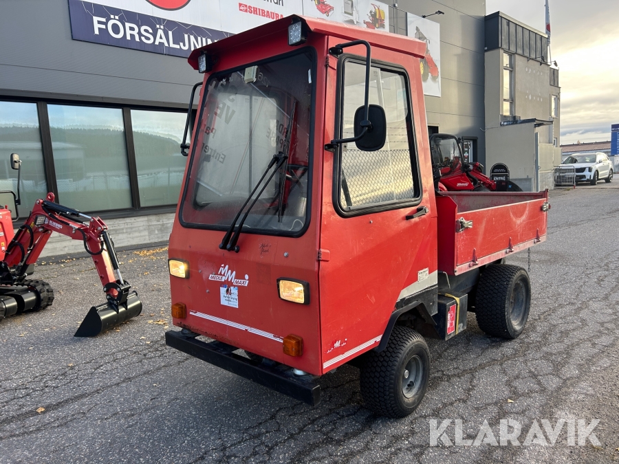 Arbetsfordon MedleMaxi MM 9000 med hydraulisk tipp på flak