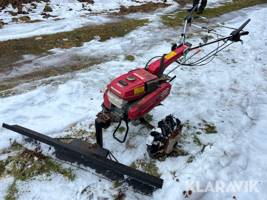 Tvåhjulstraktor Honda F560 med snöblad & jordfräshjul