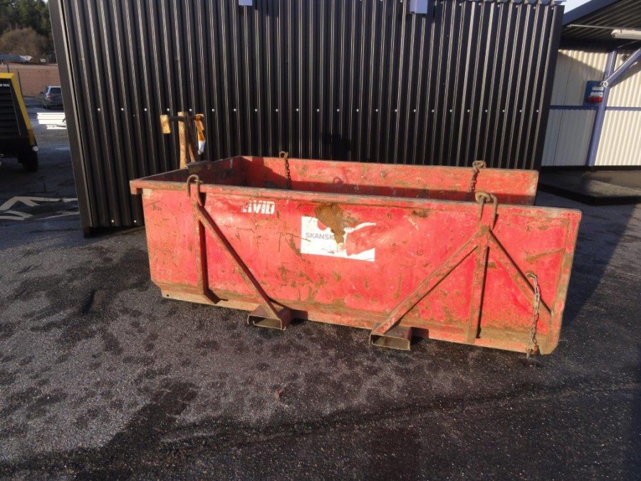 Materialbask, självtömmande