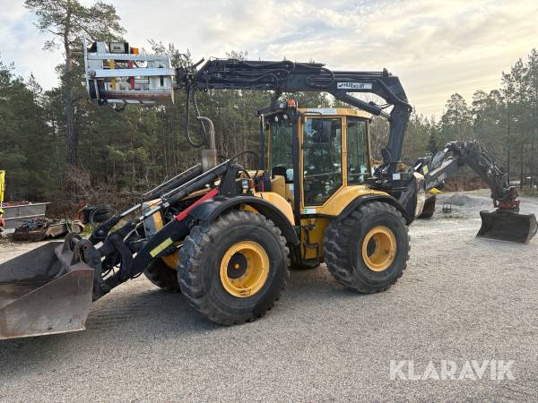 Grävlastare Huddig 1160D med korg, tiltrotator och redskap
