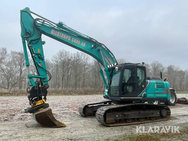 Bandgrävmaskin Kobelco SK210LC-10E med tiltrotator