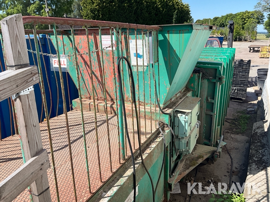 Komprimator med container