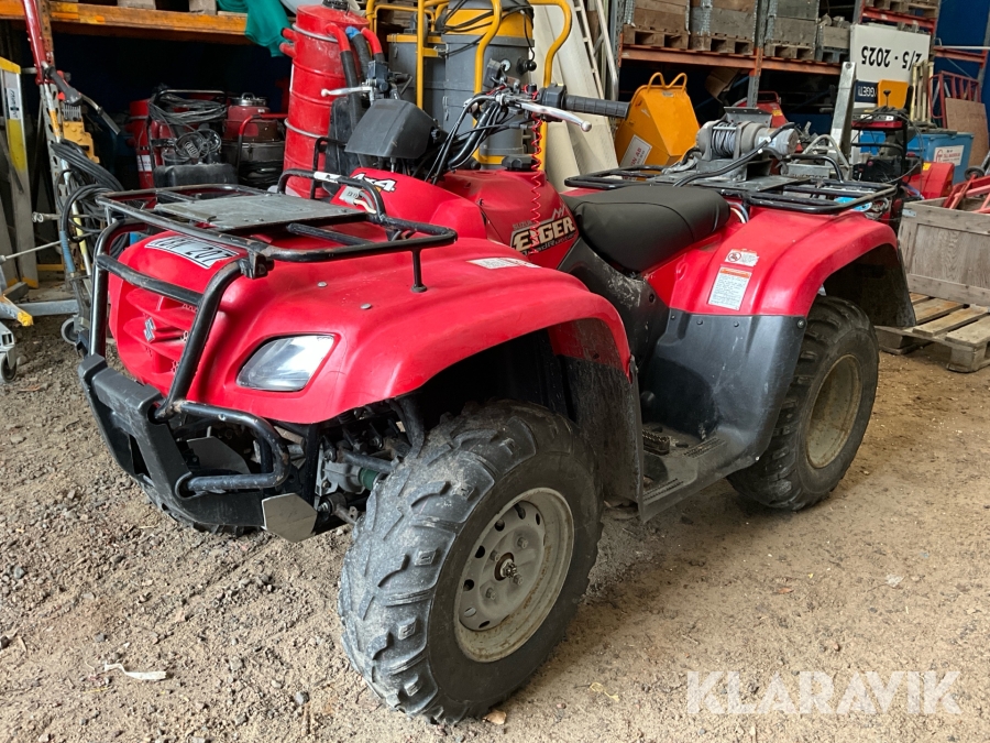 Fyrhjuling Suzuki Eiger quadrunner 400 4x4 med snöplog