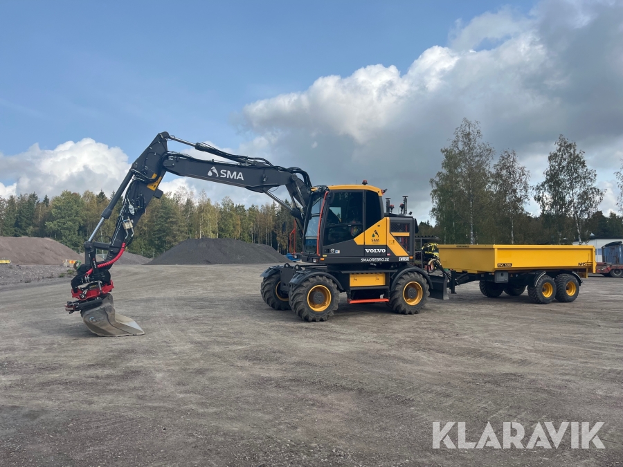 Hjulgrävare Volvo EWR150E med dumpervagn  och planerskopa