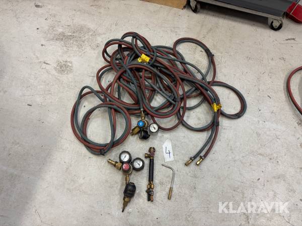 Gasslang med munstycke och gasklockor