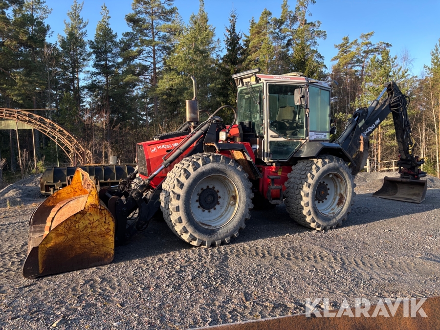 Grävlastare Huddig 1160 med nyrenoverad motor och redskap